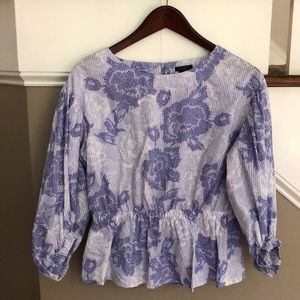 Periwinkle top. Elastic on sleeves and waist. 1 button back. SP. never worn